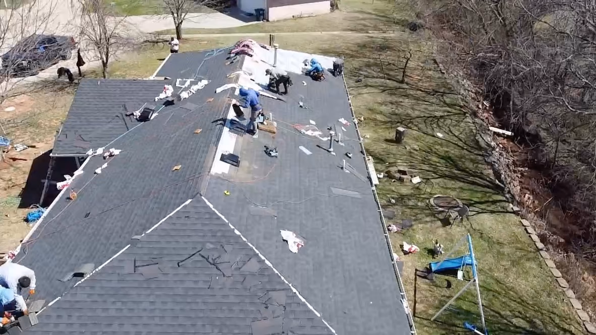 Osuna Roofing crew installing new roof Oklahoma City