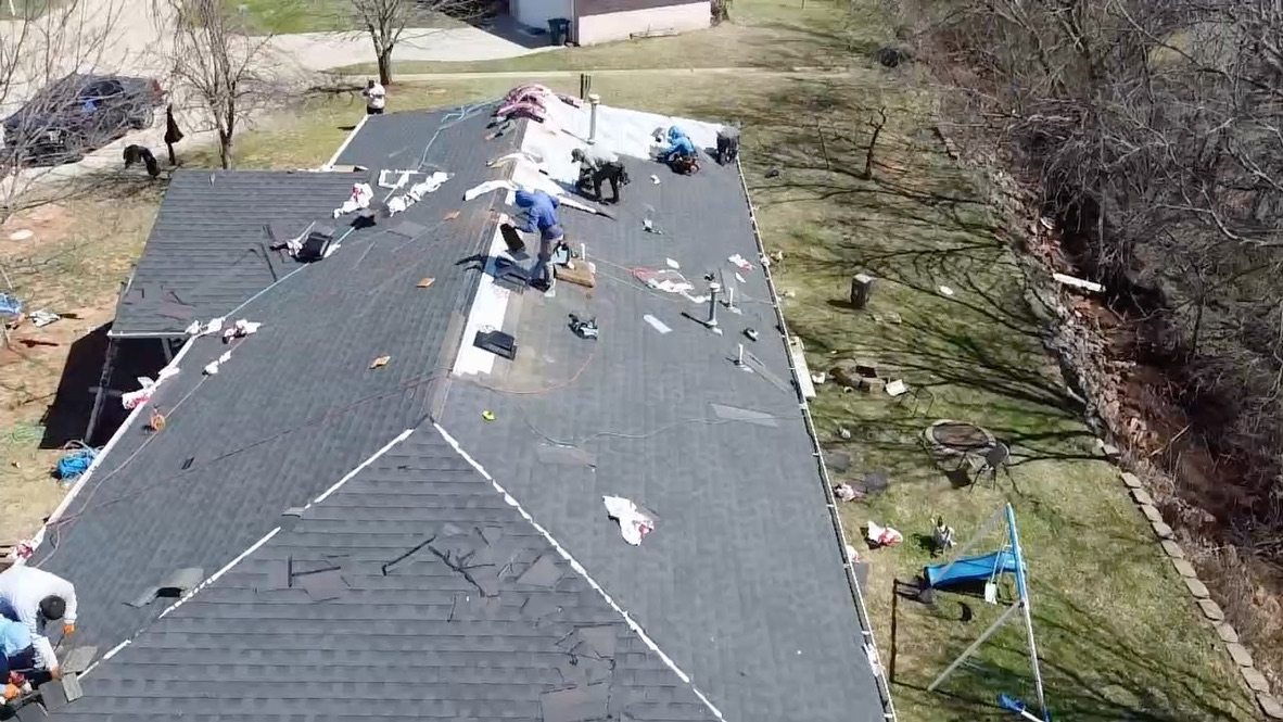 Osuna Roofing crew installing new roof Oklahoma City